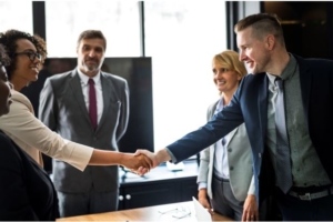 Diverse team of four meeting interview candidate