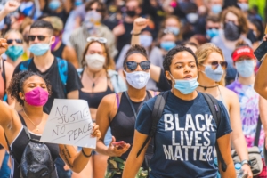 Young women marching for justice.